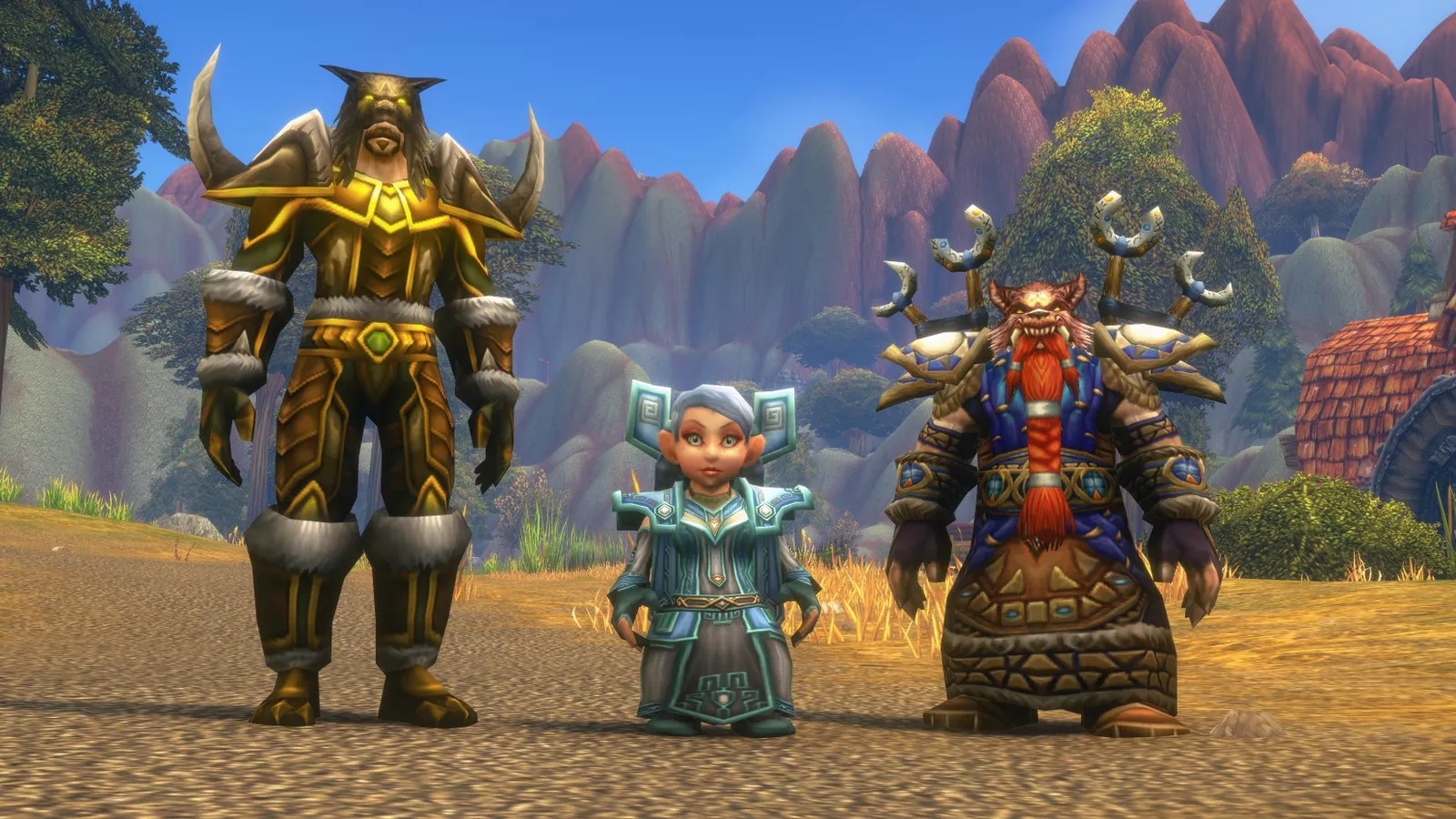Три персонажа WoW: Forever в экипировке на фоне гор